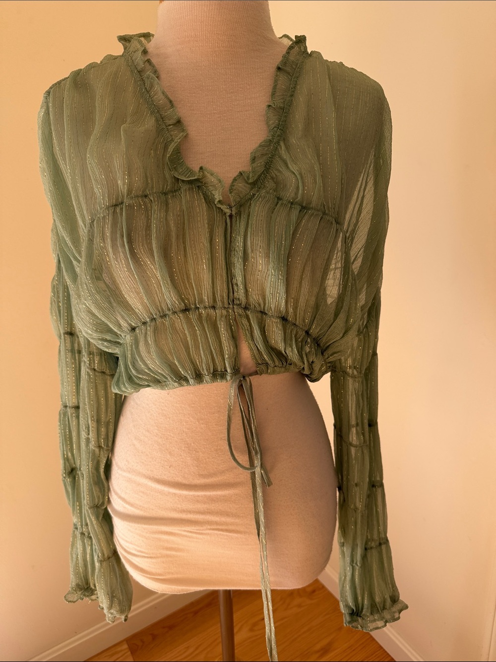Hansen & Gretel small sage green with gold lines ithica sheer top.